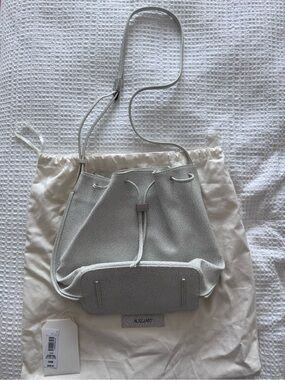 Auxiliary White Textured Drawstring Shoulder Bag